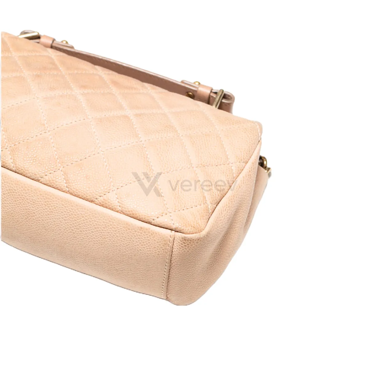 Sample photo 2, Back Appearance: the back and base of the beige quilted bag