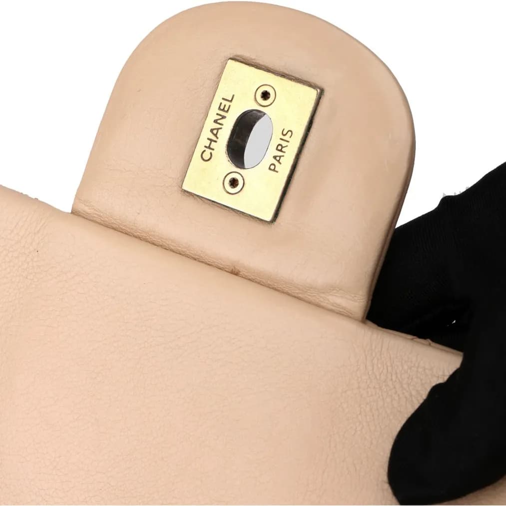 Sample photo 8, Hardware Lettering with Logo: the turn-lock plate under the flap, engraved CHANEL PARIS