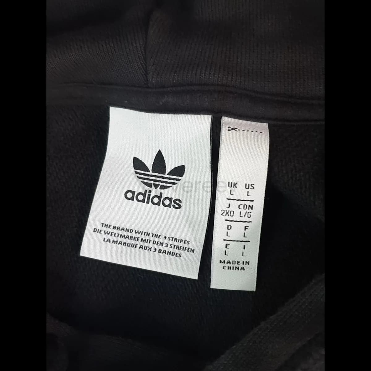 Sample photo 3, Brand Tag: the adidas neck label and size tag