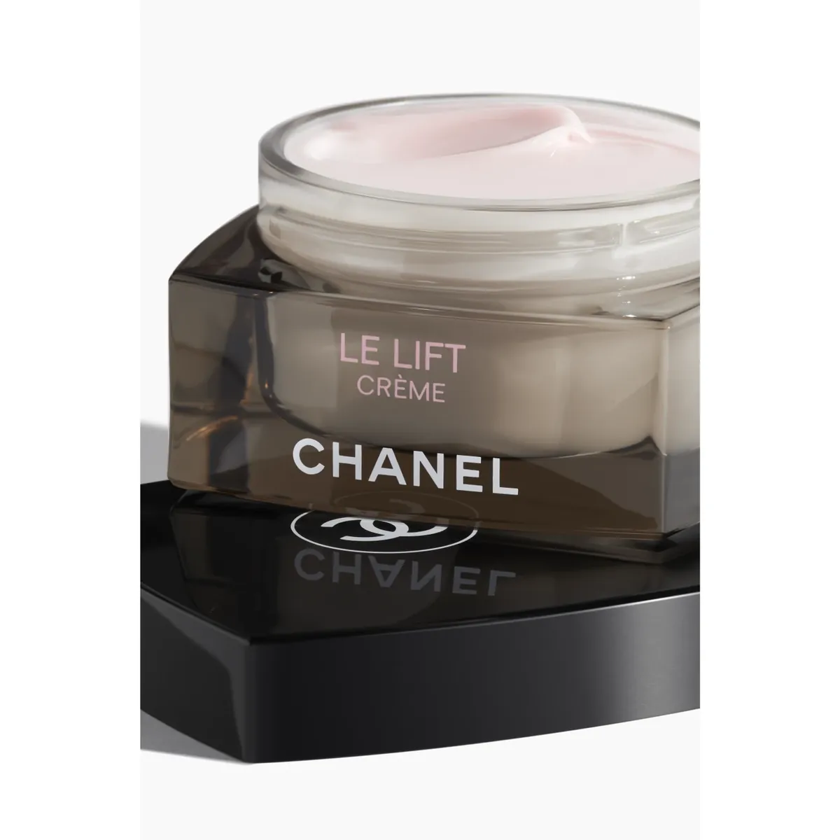 Sample photo 1, Main Product: a jar of Chanel Le Lift Crème on a black base