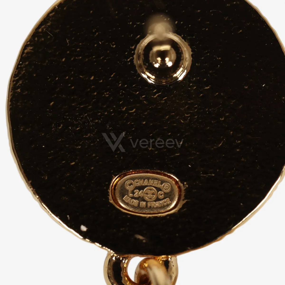 Sample photo 2, Stamp: the back of an earring with its oval CHANEL MADE IN FRANCE stamp plate