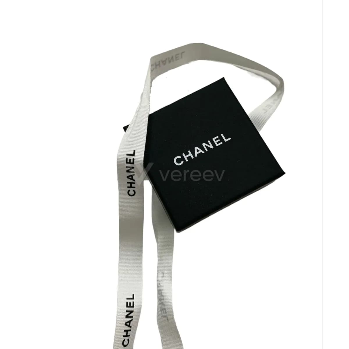 Sample photo 3, Box: a black Chanel jewelry box with a white ribbon