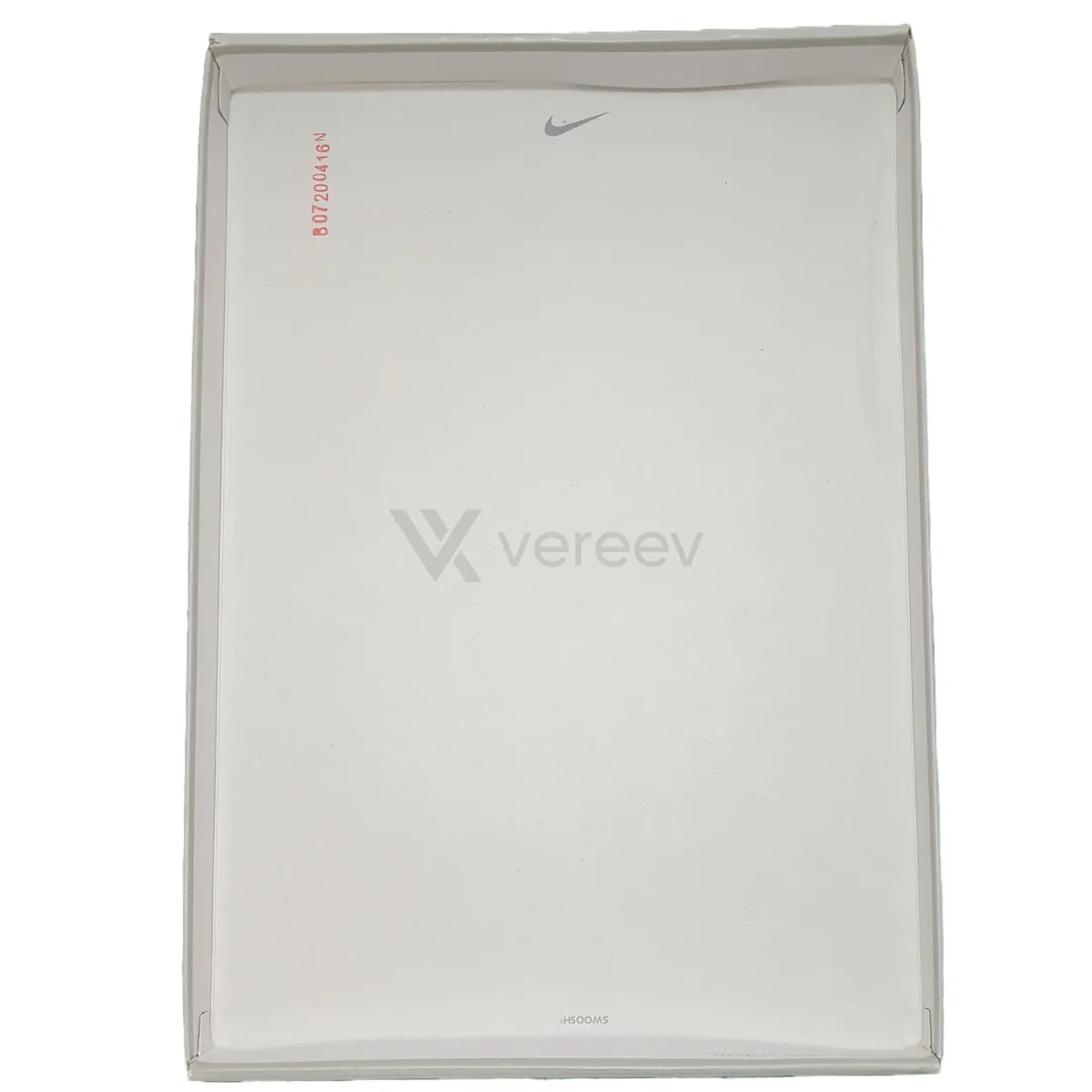 Sample photo 10, Packaging Overview: the open shoe box with its Swoosh-printed paper insert