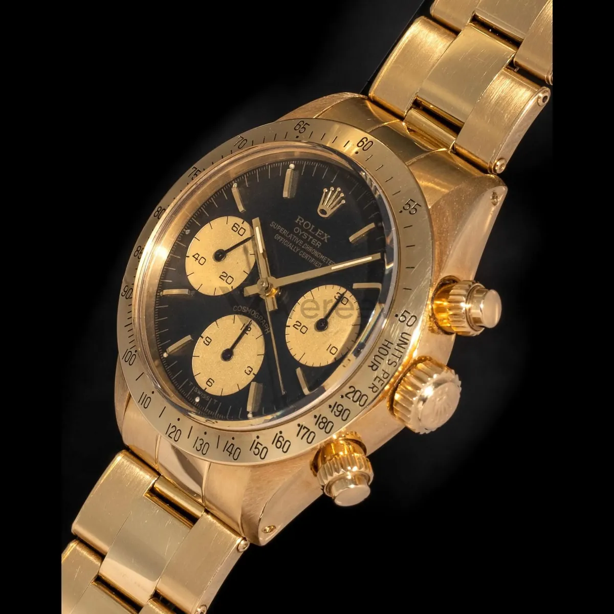 Sample photo 3, Case Detail: the gold case, bezel, crown and pushers from an angle