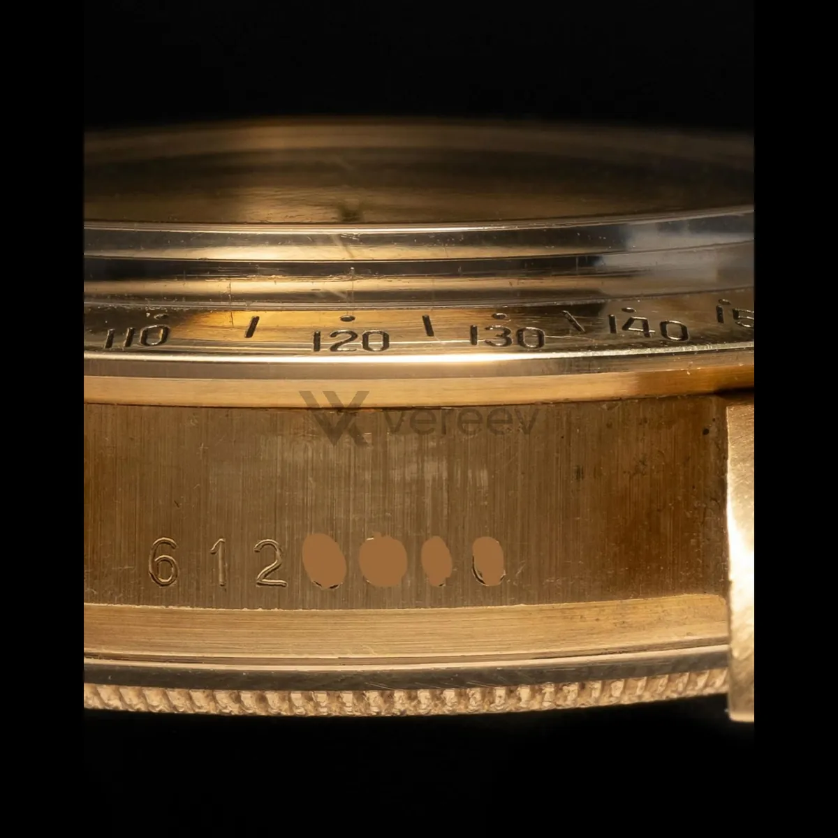 Sample photo 4, Crown / Side Profile: the case side between the lugs, engraved with a serial number that is partly hidden